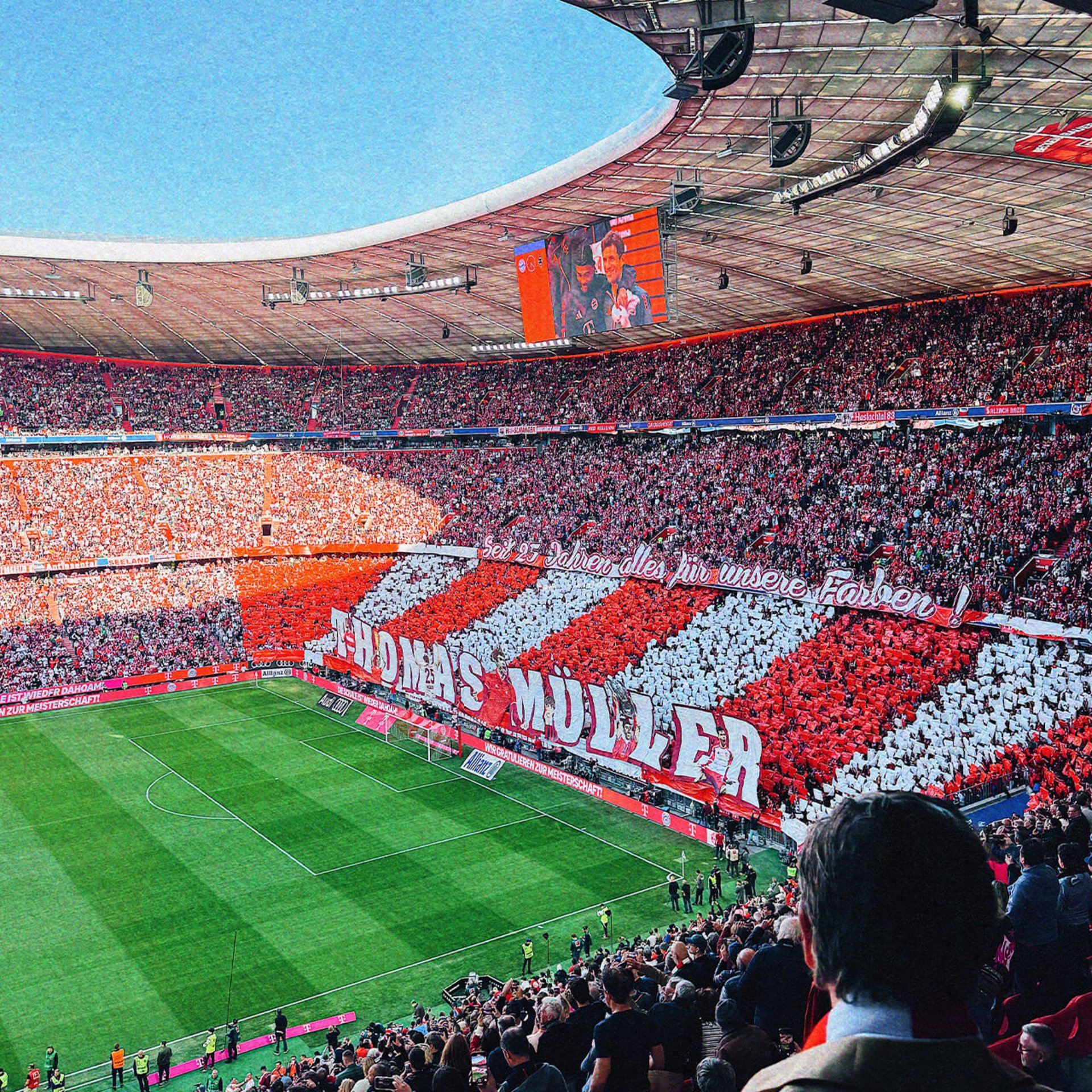 Fan choreography in the Allianz Arena spelling out Thomas Müller's name in red and white